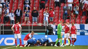 Denmark players form a shield around christian eriksen while he receives medical attention after collapsing. V5y61thadsvc0m