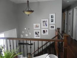 These small space decorating ideas will help you maximize each square foot of your house. Bi Level Entry Split Entry Staircase Stairwell Stairs Decor Picture Frame Layout Split Foyer Livingroom Layout Raised Ranch Remodel