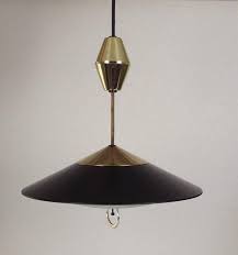 See full list on doityourself.com Vintage Mid Century Modern Retractable Pull Down Ceiling Light Fixture Ceiling Lights Lighting And Ceiling Fans Mid Century Ceiling Light