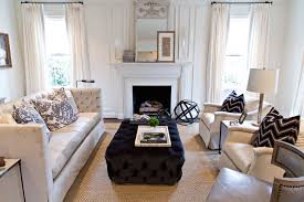 When decorating a living room with furniture, most of us add a sofa, chairs and tables when putting the room together. Black Velvet Tufted Ottoman Transitional Living Room Dana Wolter Interiors