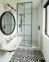Black and white mosaic tile bathroom floor. Black And White Bathroom With Hand Painted Mosaic Tile Floating Sink And Black Matte Har Bathroom Interior Design Bathroom Interior Small Bathroom Makeover