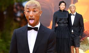 This piece will look at pharrell williams' wife, helen lasichanh. The Lion King Pharrell Williams Joined By His Wife Helen Lasichanh At London Premiere Daily Mail Online