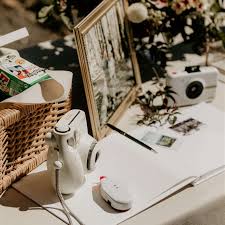 This will reveal the slot. How To Set Up A Polaroid Guest Book Table At Your Wedding