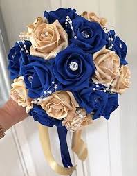 Romantic red wedding bouquets are perfect for nearly every wedding season, but we especially love these punchy bundles of blooms for a wedding on use classic roses, garden roses, peonies, clematis, anemones, or ranunculus for your red details. Bridesmaids Posy Bouquet Royal Blue And Gold Roses With Pearl Loops Ebay