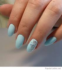 Gold glitters can instantly transform the look of your nails. Amazing Light Blue Nail Design