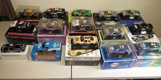 2 ea 24512 1:24 scale mountain dew car. Absolute Auction Realty