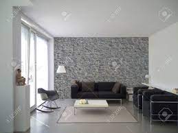 Tiling can be a big project and investment, especially if you plan to tile an entire room like a kitchen or living area. Wohnzimmer Mit Natursteinmauer Und Exemplar Fur Ihre Eigenen Bilder Lizenzfreie Fotos Bilder Und Stock Fotografie Image 66497960