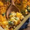 To make the topping, combine 1/2 cup crushed ritz crackers and 1 tablespoon melted butter. 1