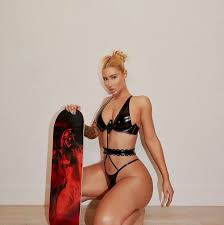 Iggy Azalea's sexiest snaps - topless display, minuscule string ...