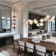 A Floating Welles Glass Chandelier In This Impeccable Tribeca Space By Michaelwoodinteriors Wood Interiors Dining Room Lighting Interior