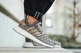 An Onfeet Look At The Upcoming Black And Olive Green Adidas Nmd R2 Primeknit Olive Green Adidas Adidas Nmd Adidas Nmd R2