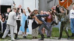 Smashing images, vandalizing buildings, and burning vestments. Terror 2000 Regie Christoph Schlingensief Filmgalerie 451