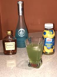 Incredible Hulk Drink 1 2oz Hennessy 2 1 2oz Hpnotiq Mix With Ice Pour Into Glass Add Slash Of Pineapple Jui Hulk Drink Incredible Hulk Drink Hennessy Drinks
