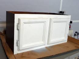 kitchen cabinets into a storage bench