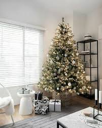 A bowl with pinecones and candles is a stylish decoration or centerpiece for christmas. 25 Scandinavian Christmas Living Room Decor Ideas