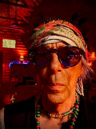 Earl Slick (official) added a new...