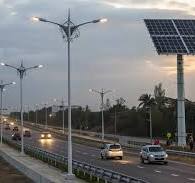 Why aren't all streetlights powered by wind and/or solar?