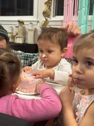 Dream Big little one! This little cutie is celebrating her 1st birthday.  You are learning so much from your sisters and you love to eat. Your  sisters were happy you shared your