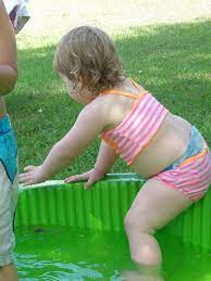 Woman in vintage bathing suit and wide brimmed hat with f. Fat Baby In Bikini Nothing Better Than Fat Babies In Bikin Annie Flickr