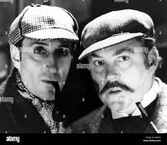 SHERLOCK HOLMES 1944 film with Nigel Bruce at left as Holmes and Basil  Rathbone as Dr Watson Stock Photo