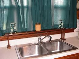 kitchen sink window plant shelf