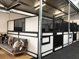 Old farm house with rock chimney and a stack of firewood black and white setting. A Luxurious Black White Barn In Australia Stable Style