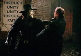 V for vendetta at a world in which great britain has become a fascist state, a masked vigilante. Warnerbros Com V For Vendetta Movies
