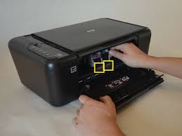 Open the cap of the ink container and connect the ink injection needle. Hp Deskjet F4480 Ink Cartridges Replacement Ifixit Repair Guide