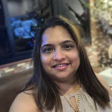 What tiffin services are available in Vesu area with less oily food?