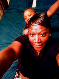 Im sitting vibing and this lady beside look at me and smile and say you so  pretty. You look like a black beauty Queen and everybody can't rock no  pixie cut and