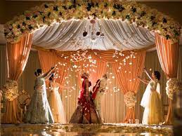 9 Things To Expect When Attending Your First Indian Wedding Hindu Wedding Decorations Wedding Stage Decorations Indian Wedding Decorations Receptions