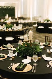Black And Gold Table Black Gold And Green Wedding Gold Table Numbers Wild Greenery Centerpieces In 2020 Green Wedding Centerpieces Green Wedding Decorations Green Gold Weddings