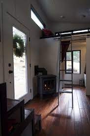 Couple Builds Amazing Mortgage Free Modern Tiny House Interview Tour Tiny House Living Small Houses On Wheels Modern Tiny House
