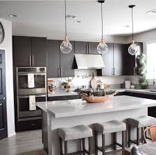 Black And Copper Kitchen Cabinets Copper Kitchen With Modern Dark Cabinets Modern Kitchen Interiors Modern Kitchen Design Kitchen Cabinets And Countertops