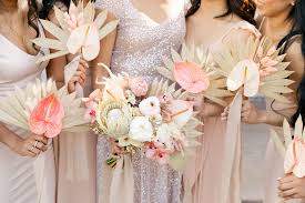Brand recommends allotting 10 percent of your overall budget to flowers as a good rule of thumb, adding that a budget of $3,000 is enough to make for a beautiful display. Colorful And Whimsical Dtla Millwick Wedding With Hanging Ribbon Flower Installations Art Soul Events