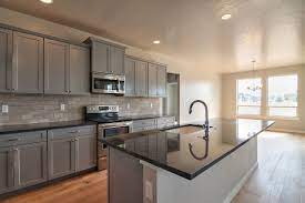 Black Granite Grey Cabinets Wood Floors Full Brown Backsplash Granite Countertops Kitchen Black Countertops Grey Granite Countertops