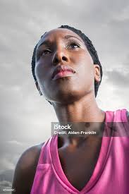 Dramatic Portrait Of Athletic African American Woman Stock Photo