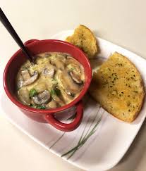 Spread the garlic butter at one side of sliced bread. Homemade Hungarian Mushroom Soup And Garlic Bread Food