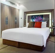 Both rooms offer bathrooms with separate bathtubs and rain showers. Two Bedroom Suite Novotel Bangkok On Siam Square