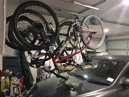 This bike storage option stores up to four bikes all the way up on the ceiling. Saris Cycling 6020 Indoor Cycleglide Garage Ceiling Mounted Bike Rack Storage Walmart Com Walmart Com