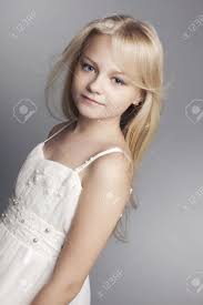 13 cute hairstyle ideas for little girls. Beautiful Little Girl With Long Hair Svetlyi On A Dark Background Stock Photo Picture And Royalty Free Image Image 12938005