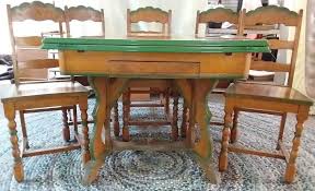 The carved wood detailing and tin tabletop give this piece of furniture an impressive look for. Sold Price Vintage Painted Tin Top Table W 6 Green Trim Chairs August 2 0119 6 00 Pm Edt