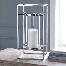 Silver aluminum and clear glass with twisted post hurricane candle holder. Hurricane Silver Candle Holder