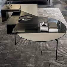 The placement of heavy aged mirror atop the coffee table makes the set a true reflection of your artistic space and sensibility. Contemporary Coffee Table Lily Shake Design Smoked Glass Bronze Round
