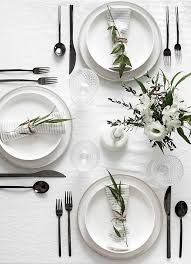 15 Outdoor Dining Table Decorating Ideas To Copy This Season Domino Minimal Table Setting Dinner Table Setting Modern Table Setting