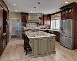 To fit the expensive cherry cabinets into the budget, the homeowners. Traditional Cherry Cabinets With Medium Brown Painted Island Crystal Cabinets