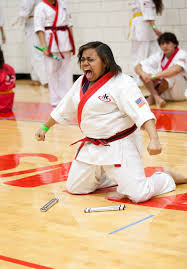 Kickstartkids Red Black Belt Performing Her Weaponskata Black Belt Black And Red Kids