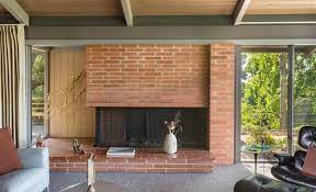 None of the rooms were relocated, but the house was opened up and restructured, and fresh. Midcentury Modern White Brick Novocom Top