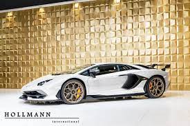 You find that someone just decided to create a handful of rainbow colored versions of the ultimate dream machine so you feel like jumping out of the window. White And Gold Lamborghini Aventador Svj Is Screaming To Be Adopted Carscoops
