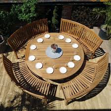 Large decorative round stone/concrete garden table 2 curved benches solid heavy stone/concrete garden furniture set comprising of a large receive the latest listings for round garden bench table. Betjeman 16 Seater Circular Teak Garden Dining Set Rattan And Teak
